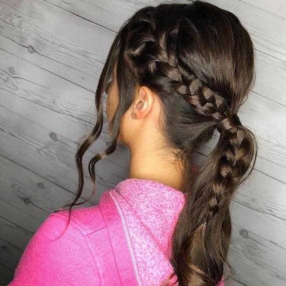 Photo of woman with hair styled in a braided ponytail for her wedding hairstyle, created using Wella Professionals