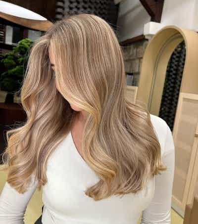 Golden blonde color and finish created with Wella Professionals and Sebastian Professional.