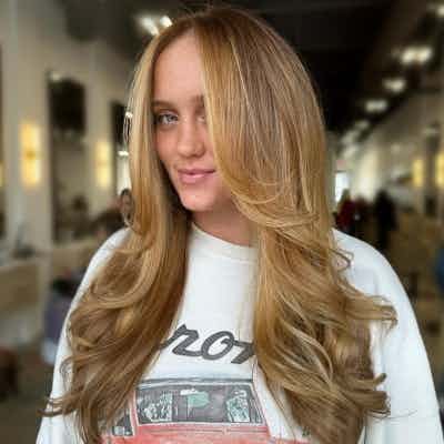 Rich golden blonde haircolor created with Wella Professionals color.